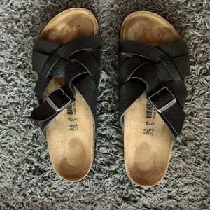 Birkenstock Black Sandals with Adjustable Straps and Contoured Footbed